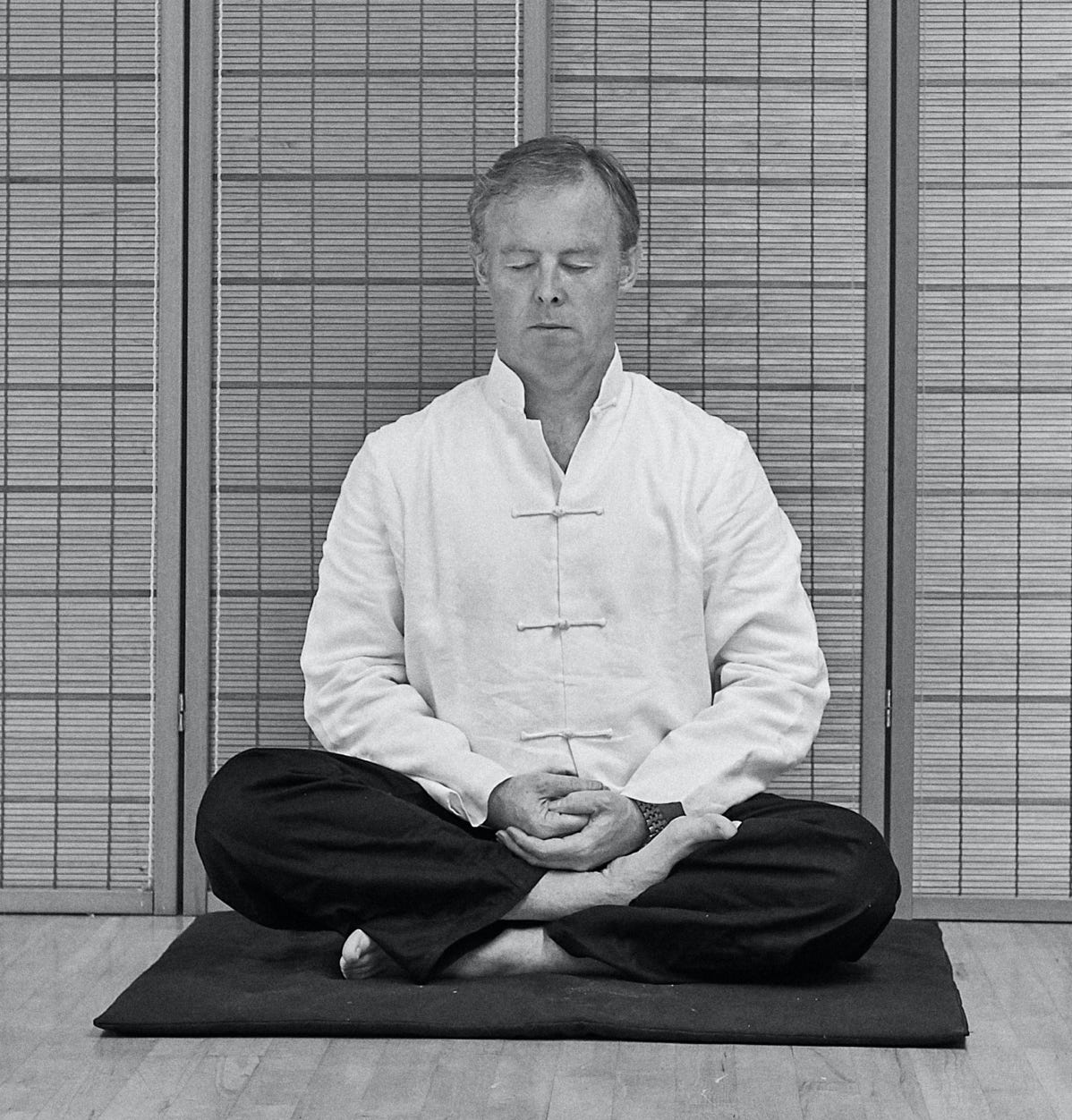 Stephen Forde sitting in a meditation posture
